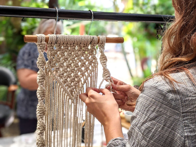 Woman at a macrame workshop